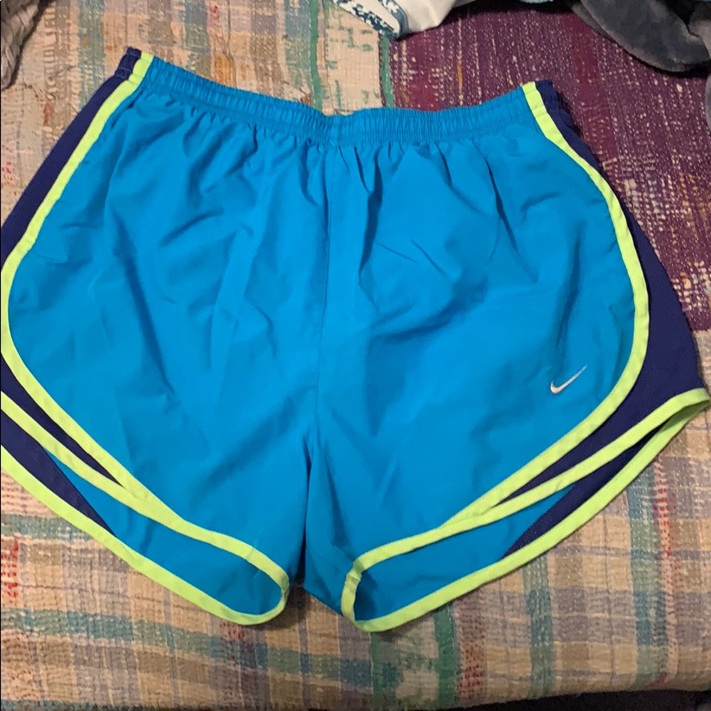 Blue nike running shorts